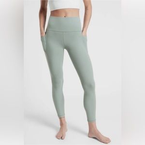 Athleta Salutation Stash Pocket 7/8 Legging. Size M. Color minimalistic grey.